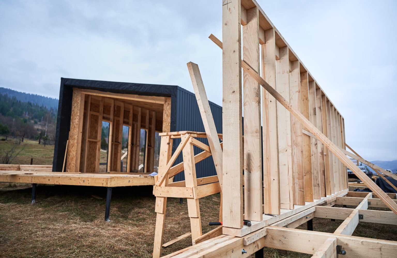 timber-frame-house-on-pile-foundation-under-constr-2025-01-16-22-43-11-utc